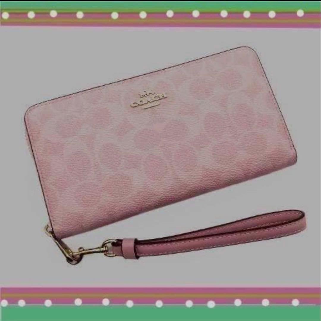 COACH コーチシグネチャー ファスナーリストウォレット長財布/パウダーピンク